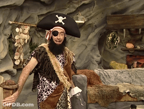 A Man Dressed As A Pirate With An Eye Patch GIF