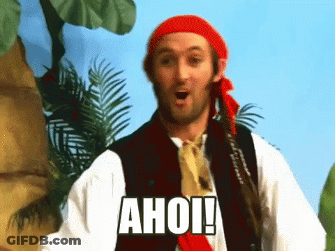 A Man Dressed As A Pirate With The Word Ahoi On His Chest GIF