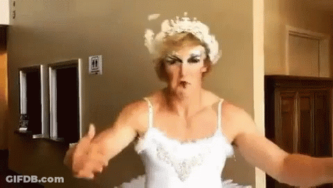 A Man Dressed As A Swan Is Shaking Hands With Another Person GIF