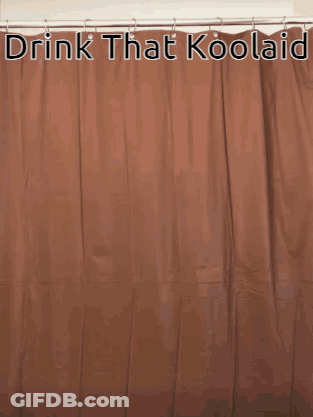 A Man Dressed In A Kool Aid Costume Holds A Cup GIF