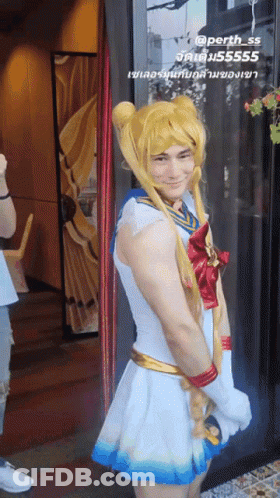 A Man Dressed In A Sailor Moon Costume GIF