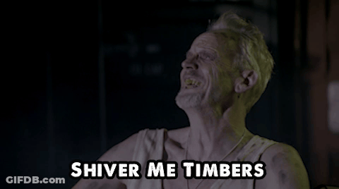 A Man Drinking From A Bottle With The Words " Shiver Me Timbers " Below Him GIF