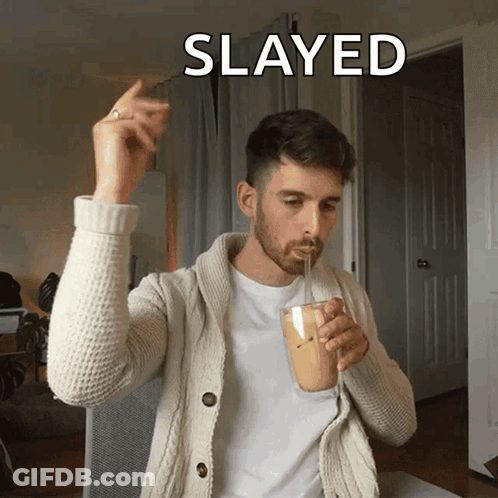 A Man Drinking Through A Straw With The Word Slayed Written Above Him GIF