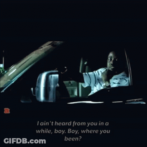 A Man Driving A Car With The Words I Ain 'T Heard From You In A While GIF