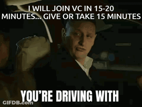 A Man Driving A Car With The Words " I Will Join Vc In 15-20 Minutes ... Give Or Take 15 Minutes " GIF