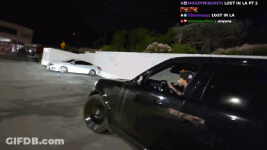 A Man Driving A Car With The Words Lost In La Pt 2 On The Screen GIF
