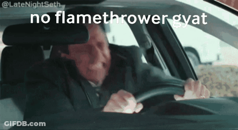 A Man Driving A Car With The Words " No Flamethrower Gyat " Written On The Screen GIF