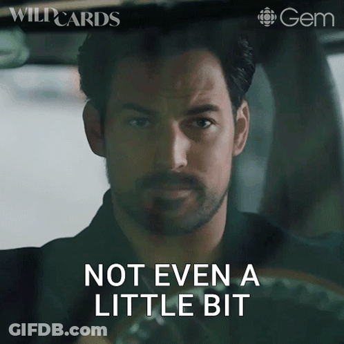 A Man Driving A Car With The Words Not Even A Little Bit Behind Him GIF