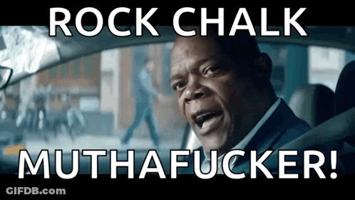 A Man Driving A Car With The Words Rock Chalk Muthafucker GIF