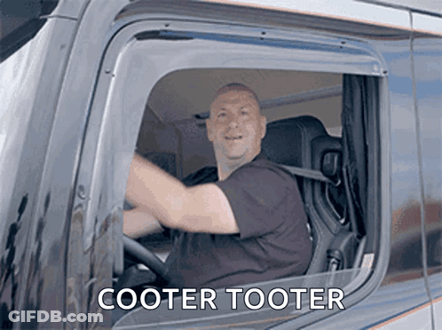 A Man Driving A Truck With The Words Cooter Tooter Written On The Side GIF