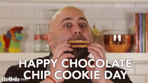 A Man Eating A Chocolate Chip Cookie With The Words Happy Chocolate Chip Cookie Day GIF