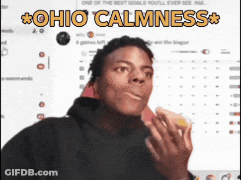 A Man Eating A Sandwich With The Words " Ohio Calmness " On The Bottom GIF