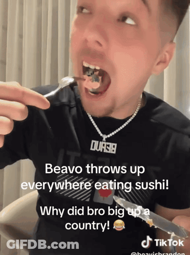 A Man Eating Sushi With A Necklace That Says Ours19 GIF