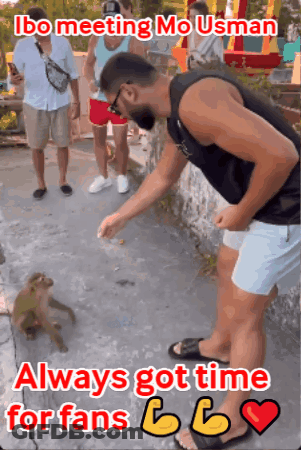 A Man Feeding A Monkey With The Caption Ibo Meeting Mo Usman Always Got Time For Fans 666 GIF