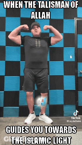 A Man Flexes His Muscles In Front Of A Blue And Black Checkered Wall With The Caption When The Talisman Of Allah GIF