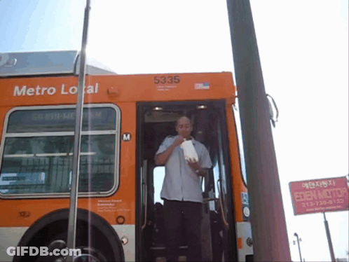 A Man Getting Off A Metro Local Bus With 5335 On The Side GIF