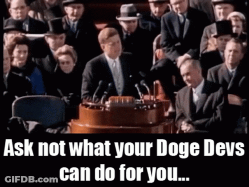 A Man Giving A Speech In Front Of A Crowd With The Words Ask Not What Your Doge Devs Can Do For You Written Below GIF