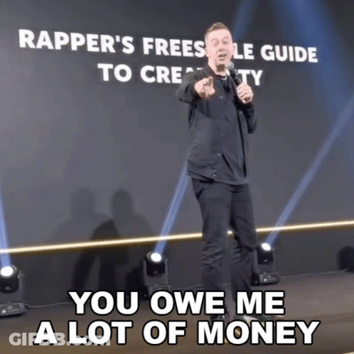A Man Giving A Speech With The Words You Owe Me A Lot Of Money GIF