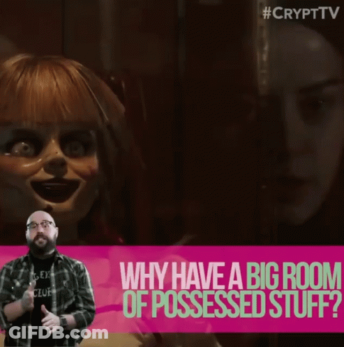 A Man Giving A Thumbs Up In Front Of A Poster That Says " Why Have A Big Room Of Possessed Stuff " GIF
