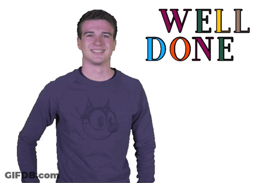 A Man Giving A Thumbs Up In Front Of A Well Done Sign GIF