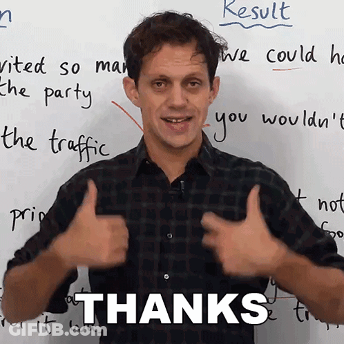A Man Giving A Thumbs Up In Front Of A White Board With The Word Thanks Written On It GIF