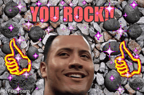 A Man Giving A Thumbs Up In Front Of Rocks With The Words You Rock GIF