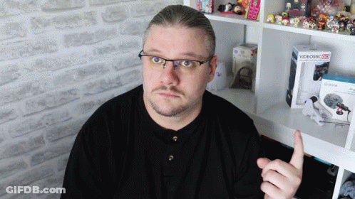 A Man Giving A Thumbs Up Next To A Videomic Box GIF