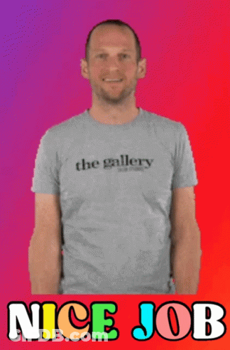 A Man Giving A Thumbs Up Wearing A Shirt That Says The Gallery GIF