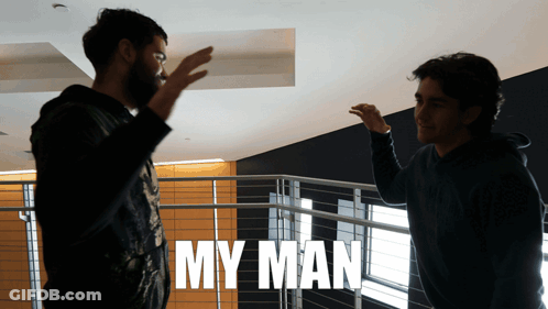 A Man Giving Another Man A High Five With The Words My Man Behind Them GIF