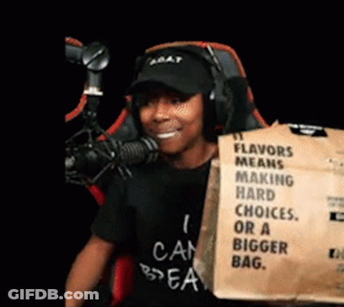 A Man Holding A Bag That Says Flavors Means Making Hard Choices Or A Bigger Bag . GIF