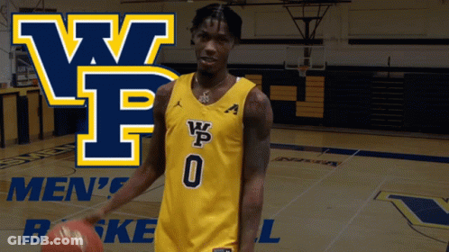 A Man Holding A Basketball In Front Of A Wpf Logo GIF