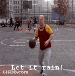 A Man Holding A Basketball On A Basketball Court With The Words Let It Rain Written Below Him GIF