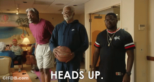 A Man Holding A Basketball Says " Heads Up " GIF