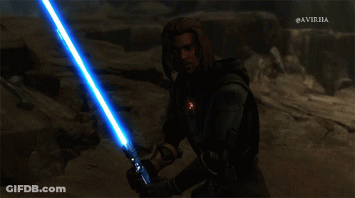 A Man Holding A Blue Lightsaber With The Hashtag @Avirha On The Bottom Right GIF