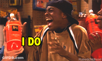 A Man Holding A Bottle Of Orange Soda With The Word I Do On It GIF