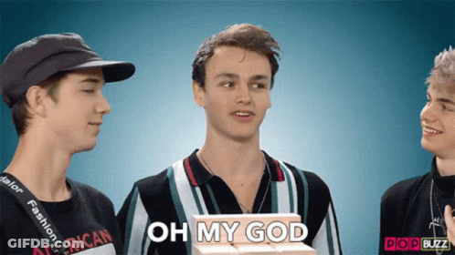 A Man Holding A Box That Says Oh My God On It GIF