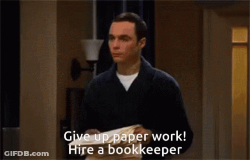 A Man Holding A Bunch Of Papers With The Words Give Up Paper Work Hire A Bookkeeper Below Him GIF