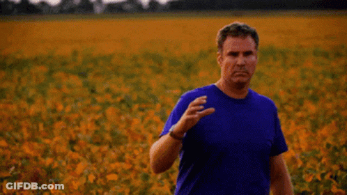 A Man Holding A Can Of Old Milwaukee Beer In A Field GIF