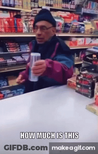 A Man Holding A Can Of Soda In A Store With The Words How Much Is This Make A Gif.com Below Him GIF