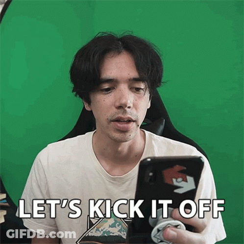 A Man Holding A Cell Phone With The Words Let 'S Kick It Off GIF
