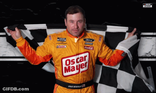 A Man Holding A Checkered Flag That Says Oscar Mayer GIF