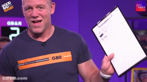A Man Holding A Clipboard With Gbr On His Shirt GIF