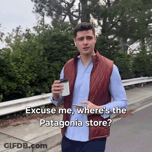 A Man Holding A Cup Of Coffee Is Asking Where The Patagonia Store Is GIF