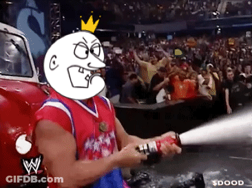 A Man Holding A Fire Extinguisher In Front Of A Crowd With A W Logo GIF