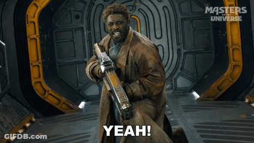 A Man Holding A Gun And Saying Yeah In Front Of Masters Of The Universe GIF