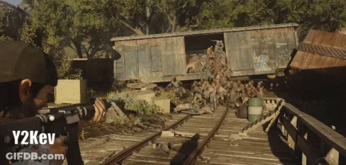 A Man Holding A Gun In A Video Game With Y2kev Below Him GIF