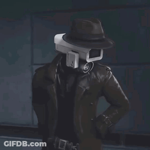 A Man Holding A Gun With A Camera Attached To His Head GIF