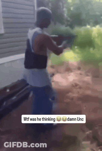 A Man Holding A Gun With A Caption That Says Wtf Was He Thinking GIF