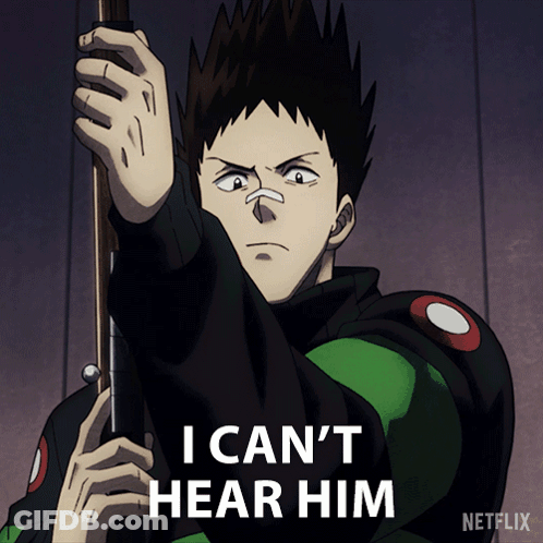A Man Holding A Gun With The Words I Can 'T Hear Him Above Him GIF