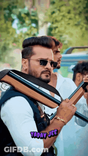 A Man Holding A Gun With Yaday Jee Written In The Corner GIF